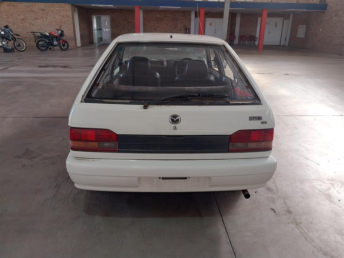 Auction Nation - MAZDA 323