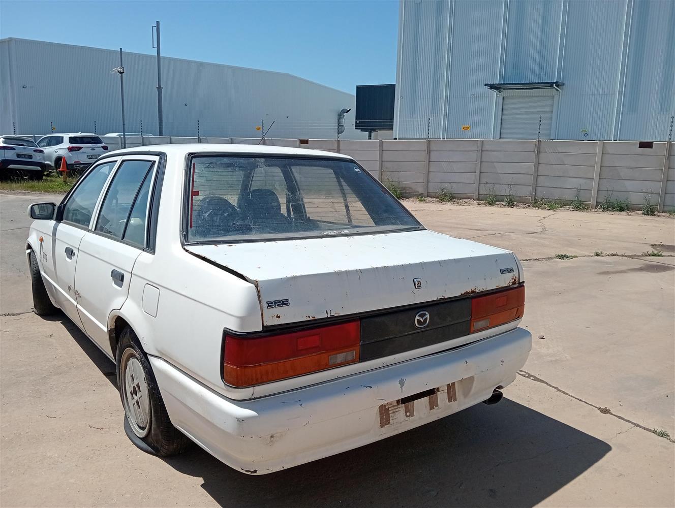 Auction Nation - MAZDA 323
