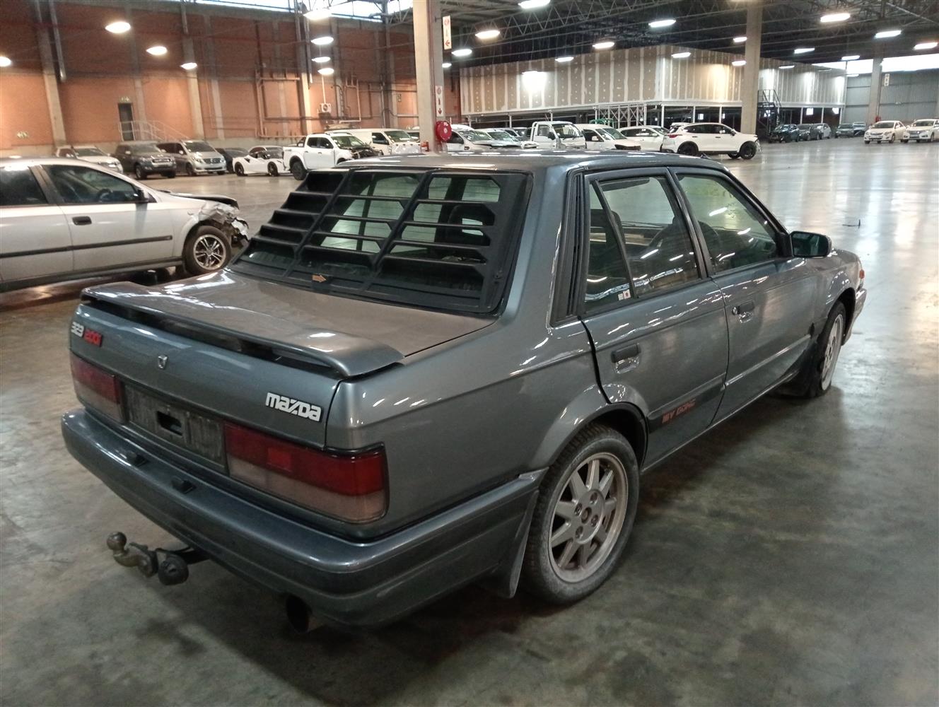 Auction Nation - MAZDA 323