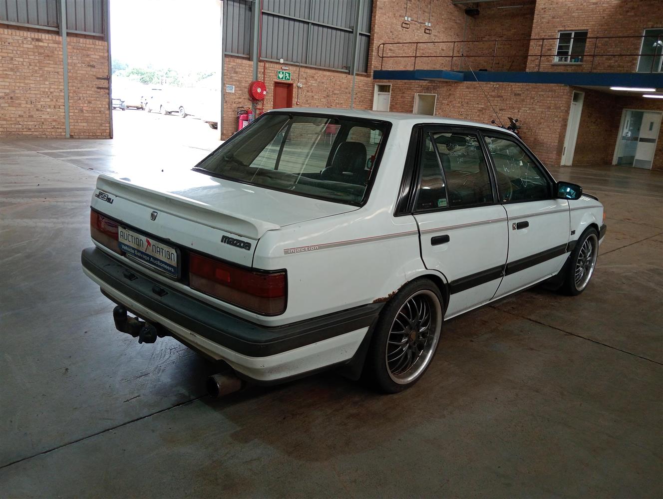 Auction Nation - MAZDA 323