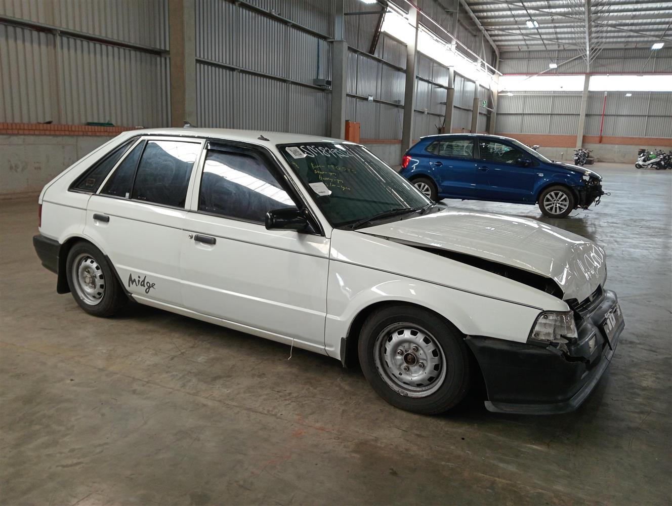 Auction Nation - MAZDA 323