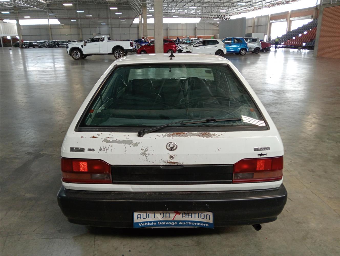 Auction Nation - MAZDA 323
