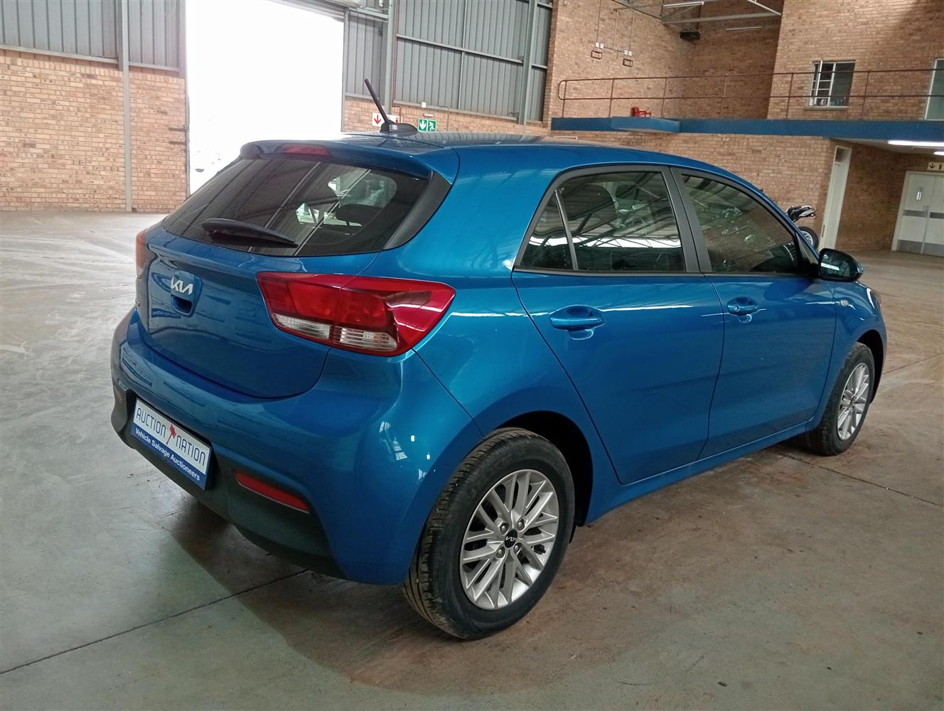 Kia Rio Behind Auction Nation - KIA RIO