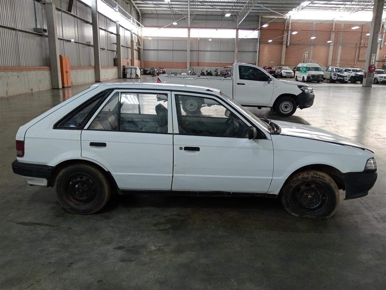 Auction Nation - MAZDA 323